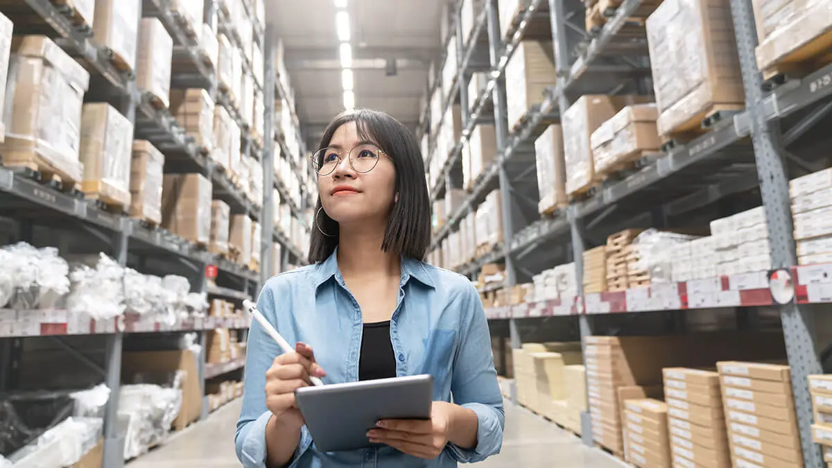 Woman taking inventory as she tries to find current assets.