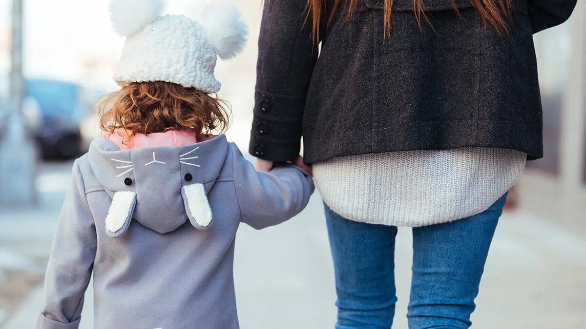 Parent and child walking