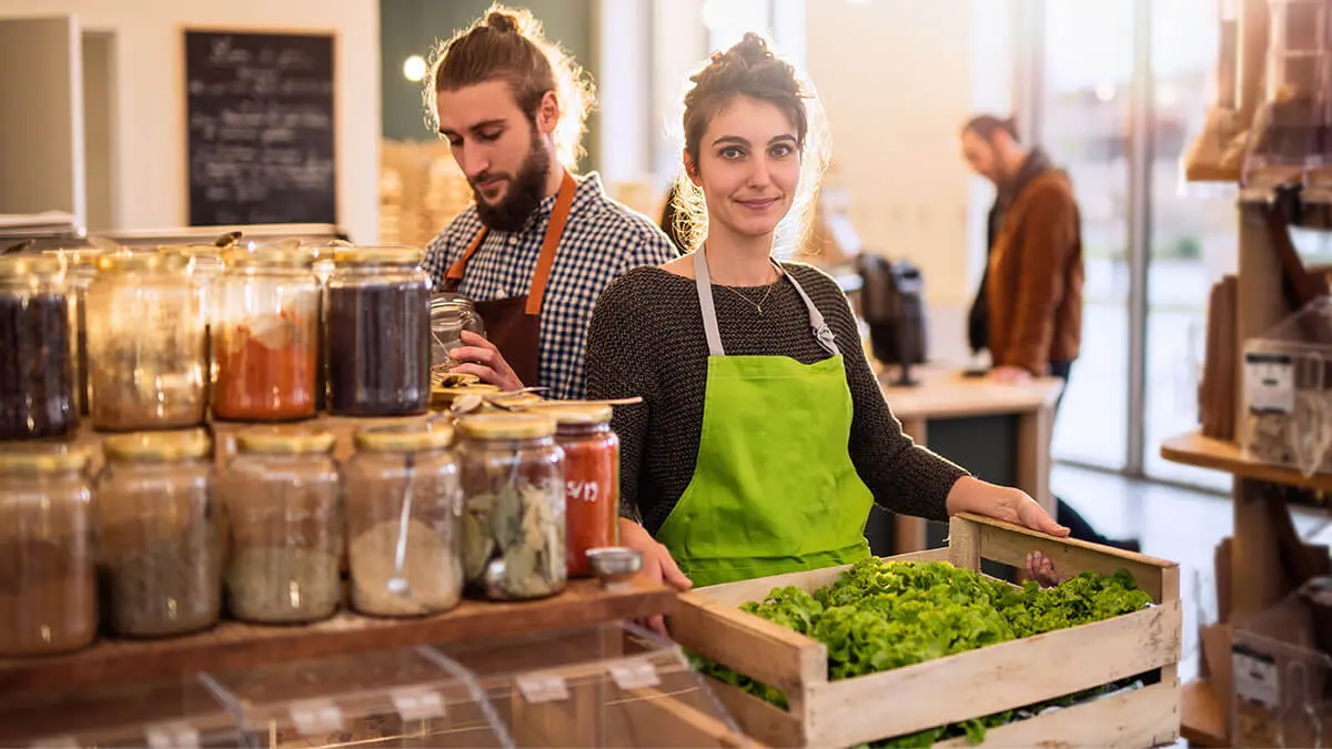 Local grocer putting out food