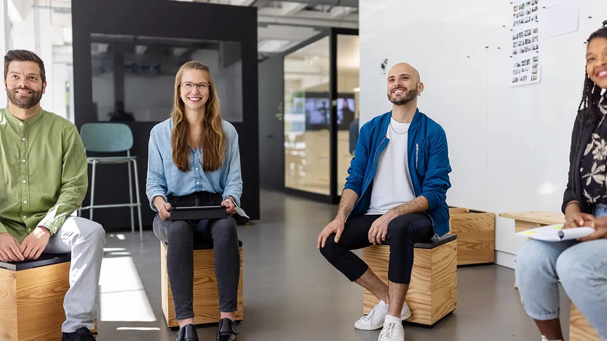 Employees sitting in a circle