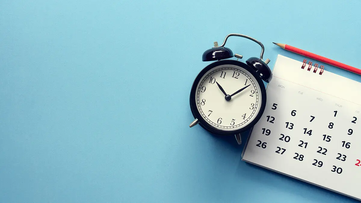 clock and calendar on a blue background