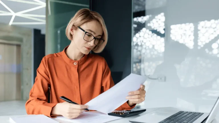 Woman looks at her company's contingent liabilities.