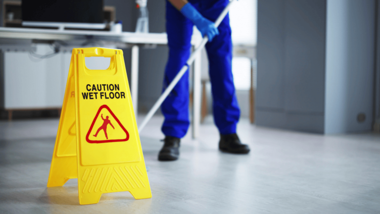 Wet floor sign to prevent workplace injury.