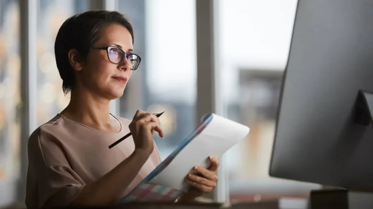 Woman learning how to fill out Form W-4.