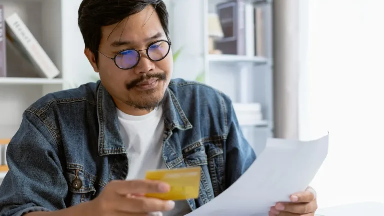 Business owner reviewing his credit card statement.